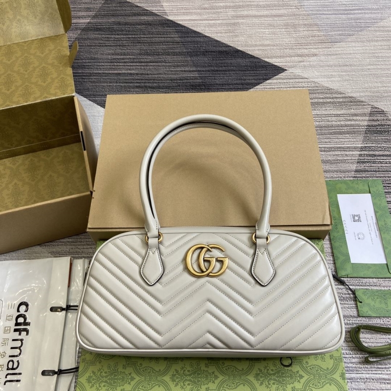 G*u*i top handle bags